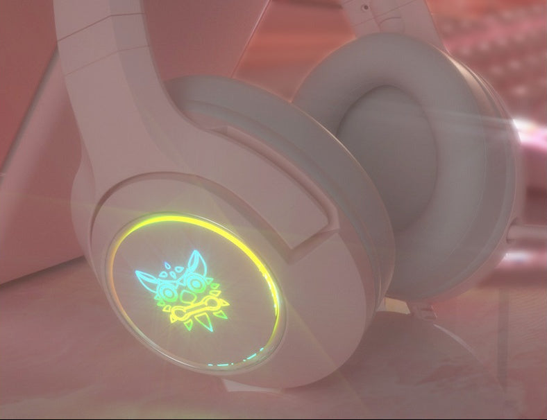 Headphones with a glowing emblem on a pink background