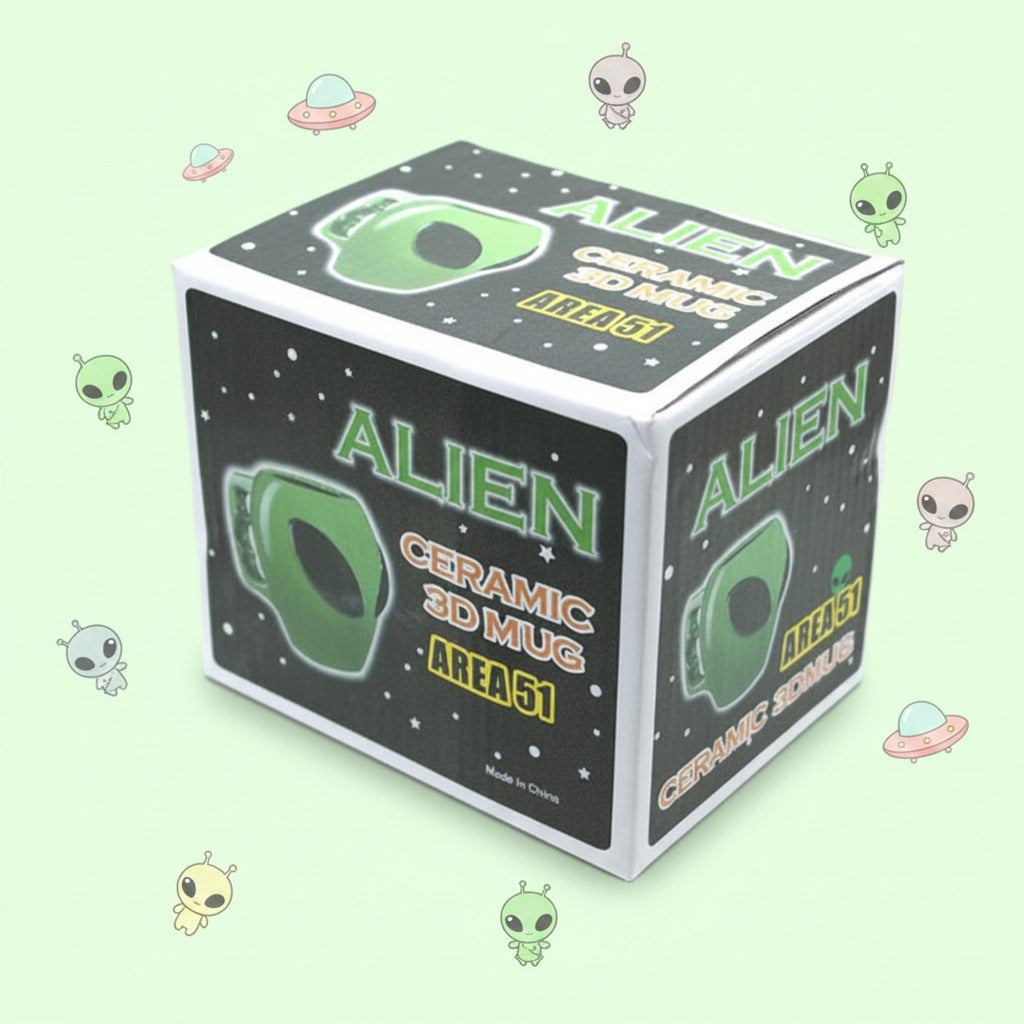 Box packaging for an 'Alien' ceramic 3D mug with green graphics on a white background