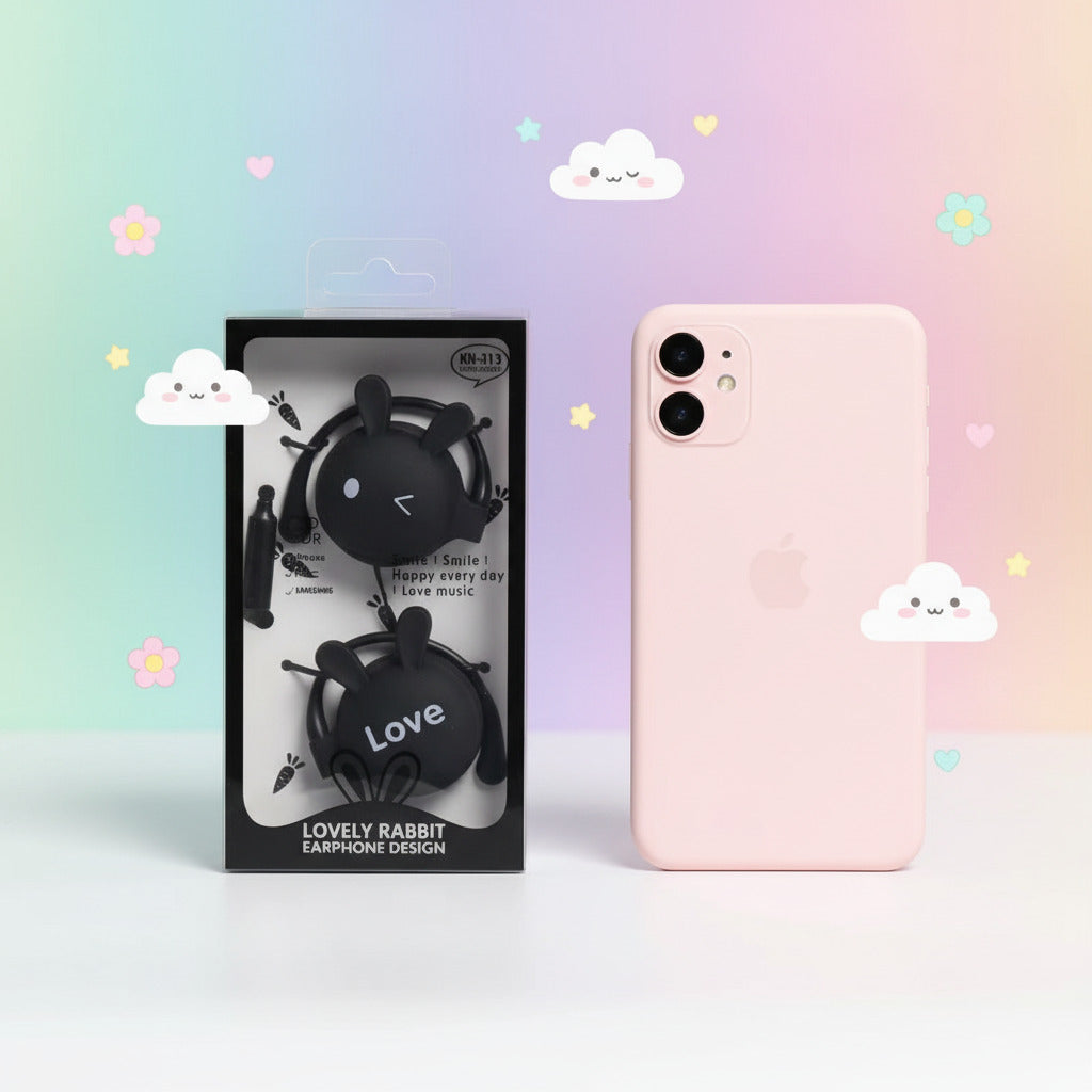 Black rabbit-shaped earrings in packaging on a white surface with decorative background