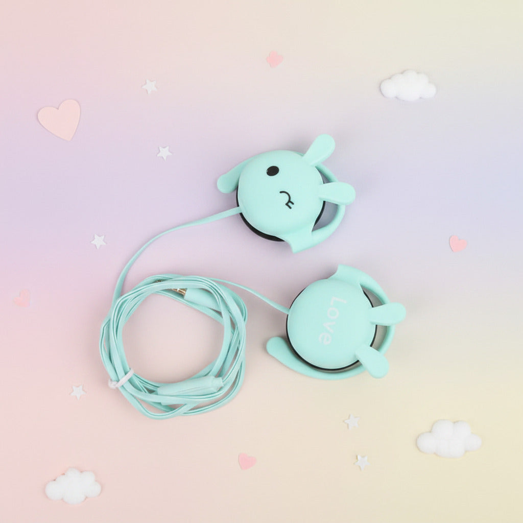 Mint green cartoon-style earphones on a light pastel background