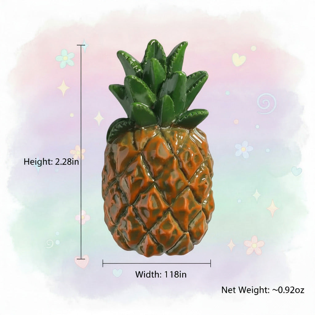 A glossy ceramic pineapple wall decor piece with a green crown and textured orange-brown body, shown on a light gray background with dimension lines and text indicating 5.8cm height, 3cm width, and net weight about 26g.