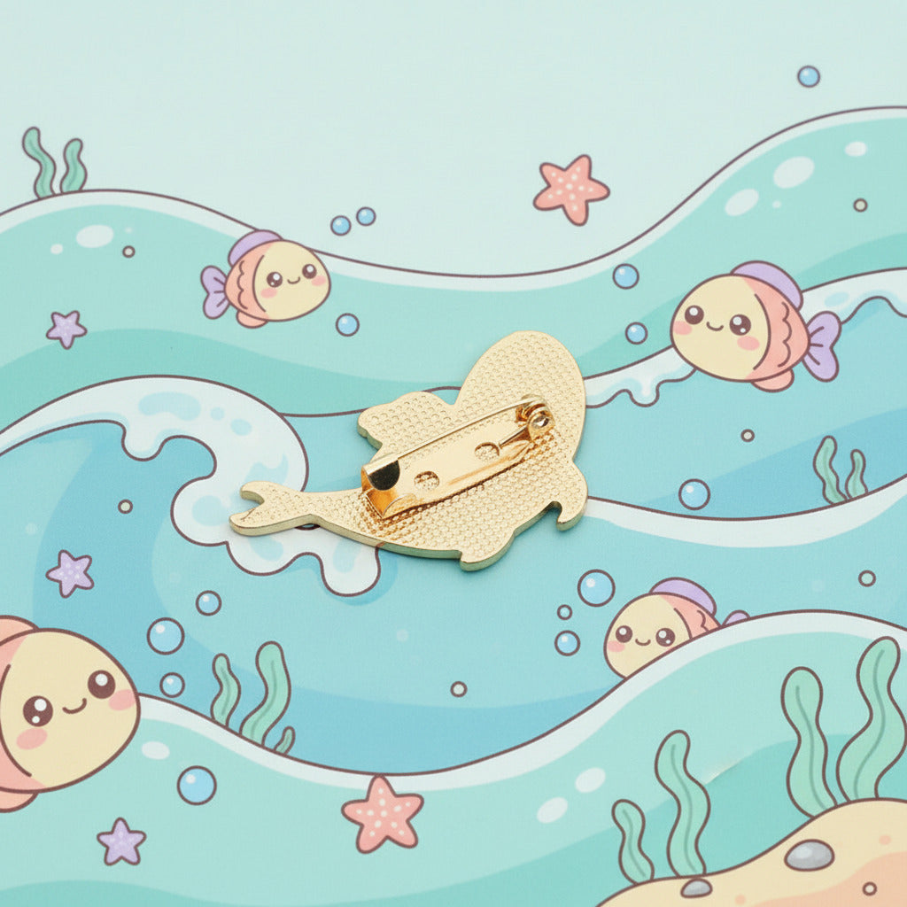 A gold-colored metal pin shaped like a stylized animal head with a textured pattern, shown from the back on a light blue background.