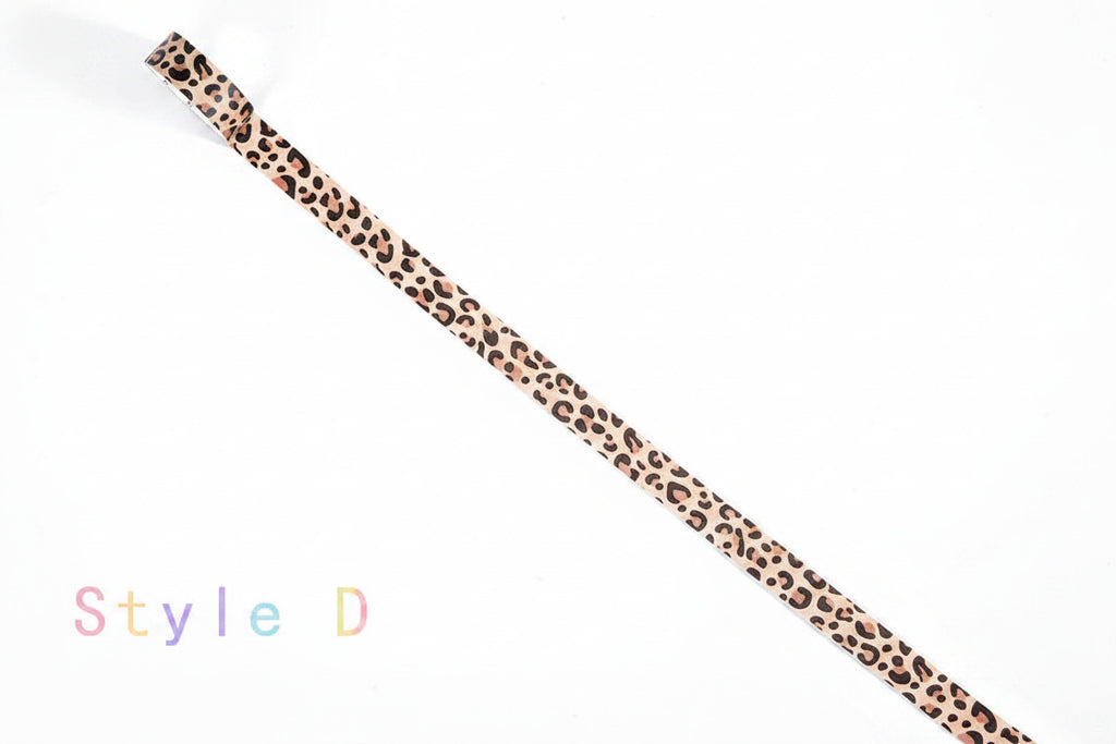 A single narrow strap or band with a leopard print pattern in beige, brown, and black, shown diagonally on a white background with the text 'Style D' in the lower left.