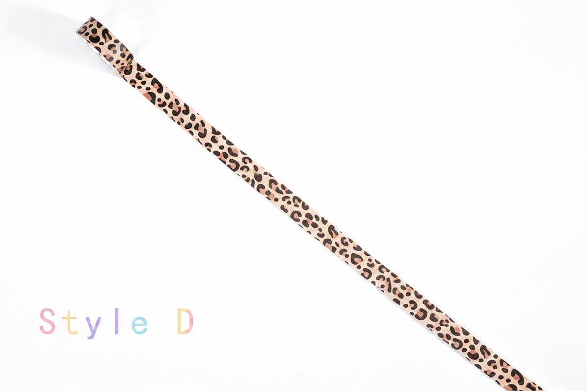 A single narrow strap or band with a leopard print pattern in beige, brown, and black, shown diagonally on a white background with the text 'Style D' in the lower left.