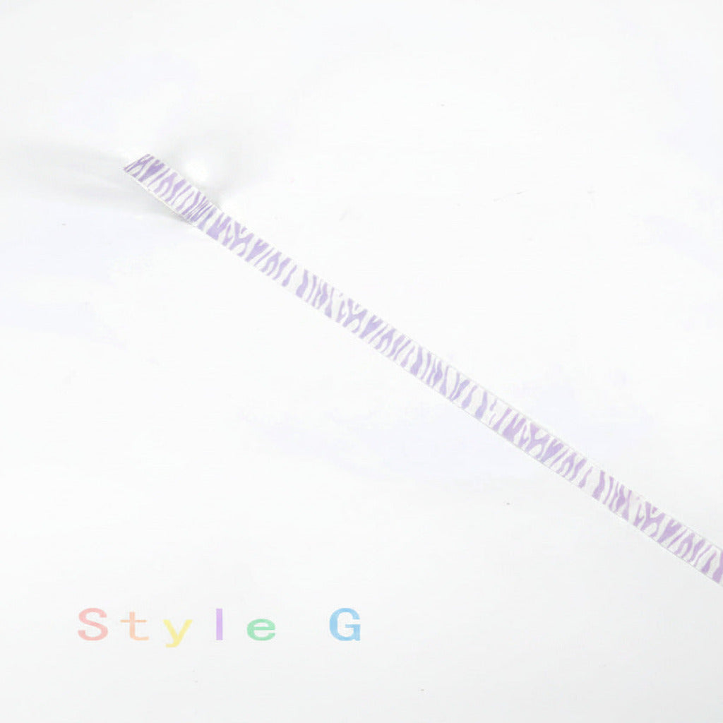 A single roll of decorative washi tape with a light purple and white zebra stripe pattern, shown diagonally on a plain white background with the text 'Style G' in the lower-left corner.