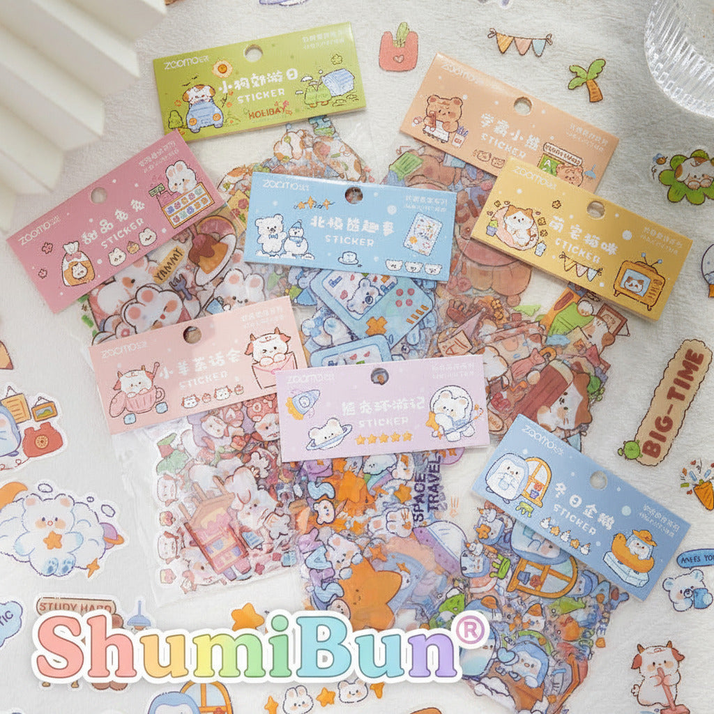 Collection of colorful sticker sheets with cartoon characters on a white surface.