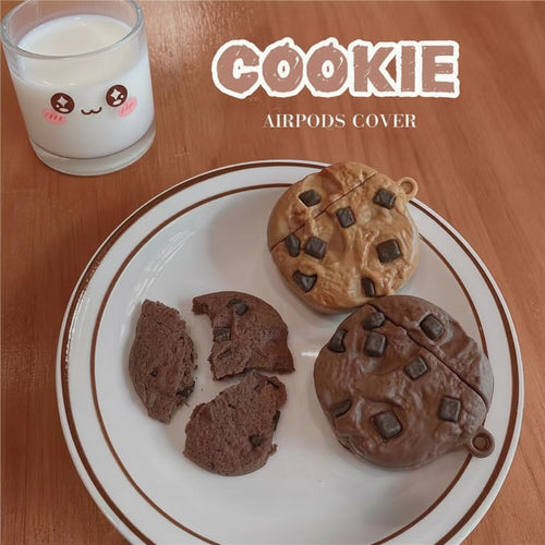 Cookie-shaped airpod case on a plate with a glass of tea in the background