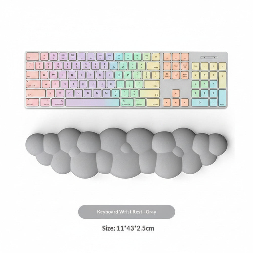 Gray keyboard wrist rest with a computer keyboard on a white background