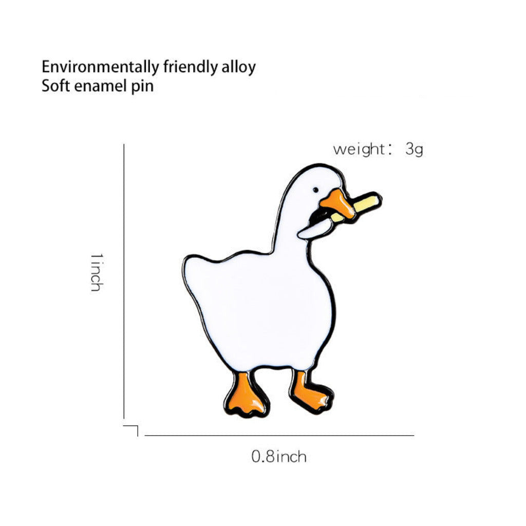 Illustration of a duck-shaped soft enamel pin with measurements and text on a white background