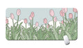 Mouse pad with pink tulip design on a white background