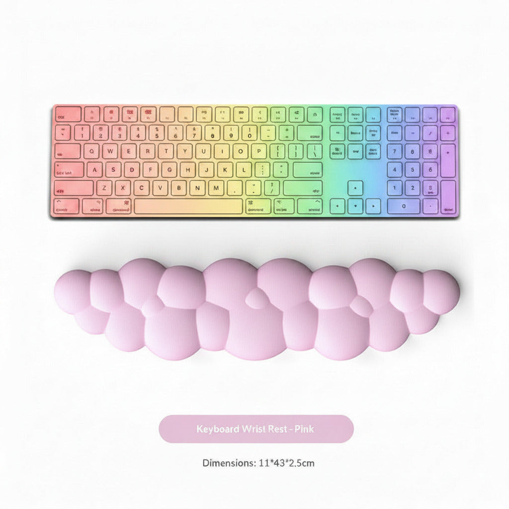 Pink keyboard wrist rest in front of a computer keyboard on a white background