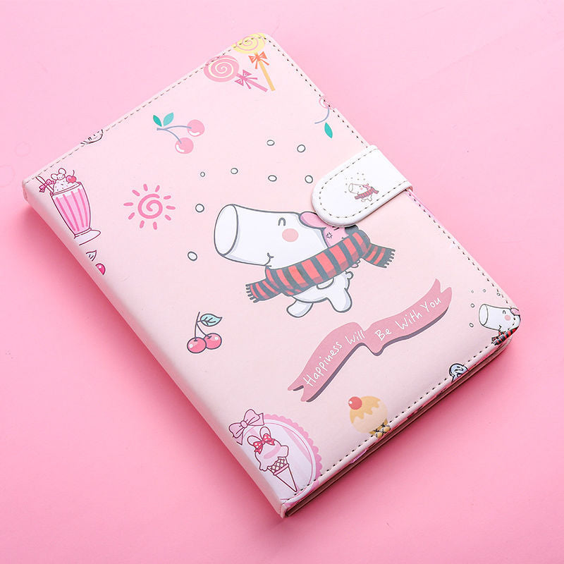 Pink notebook with cartoon character and cute illustrations on a pink background