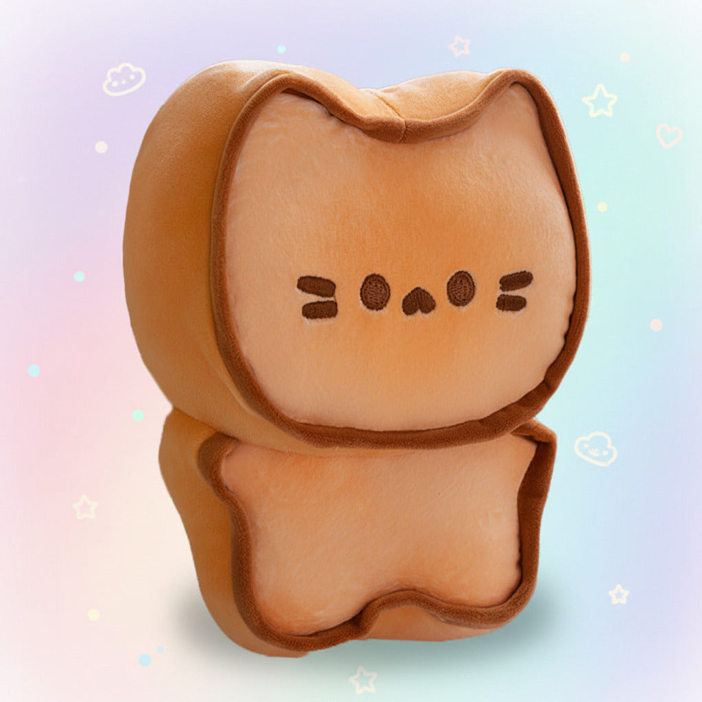 Plush toy resembling a sandwich with a face on a white background