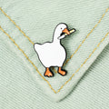 White duck pin on a denim fabric background