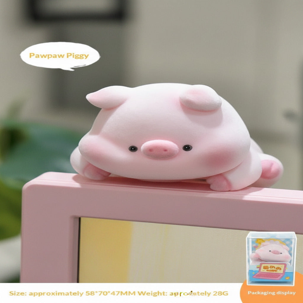 Pink piggy-shaped product on a black surface with packaging display in the corner.