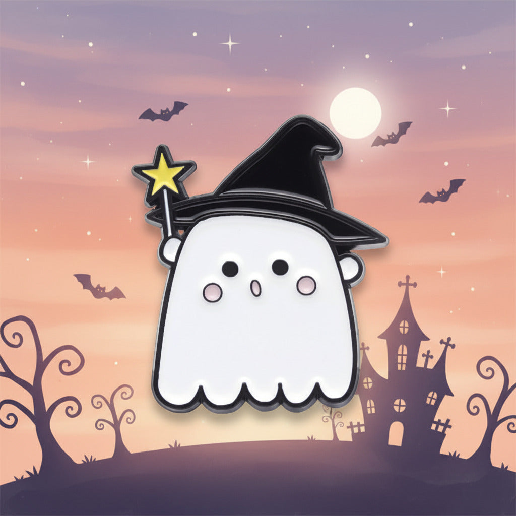 A cute cartoon ghost enamel pin wearing a black witch hat and holding a yellow star wand, on a plain white background.