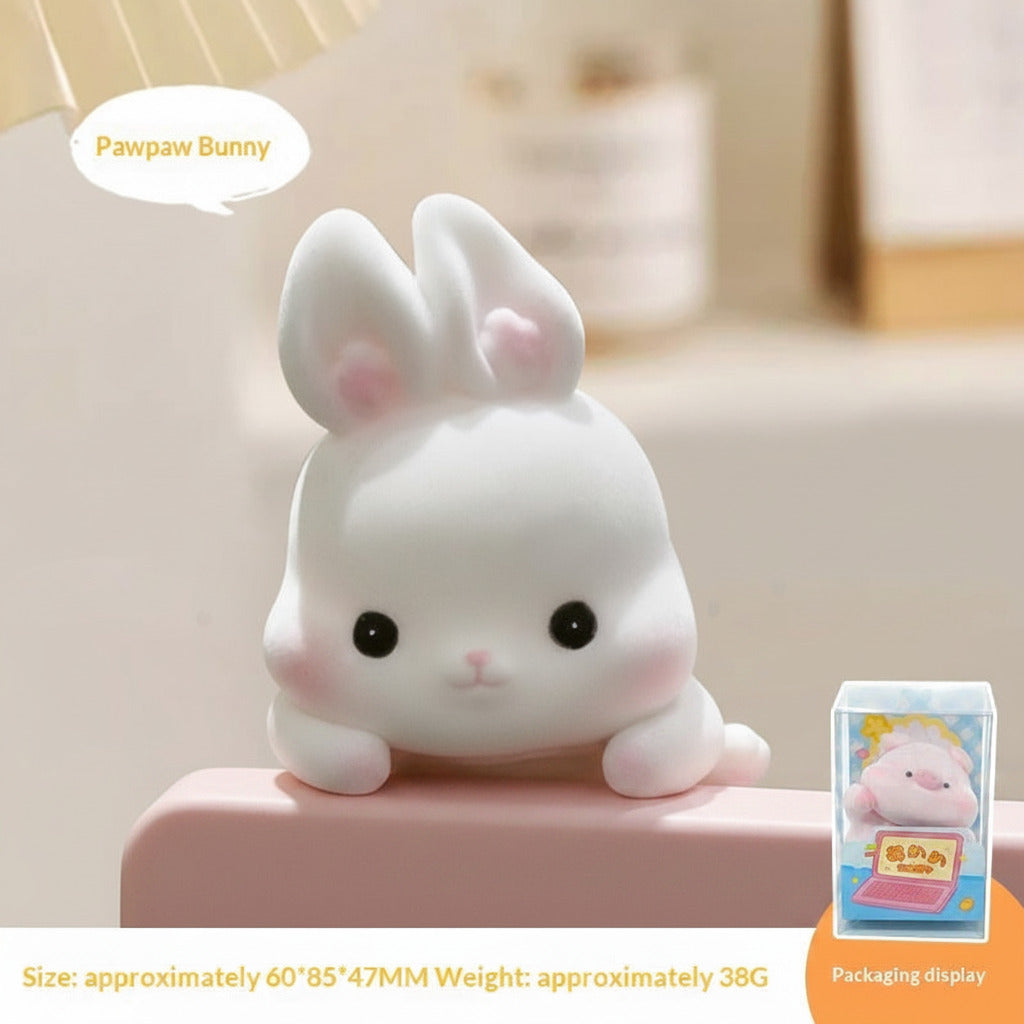 Cute white rabbit-shaped product with packaging display on a blurred background